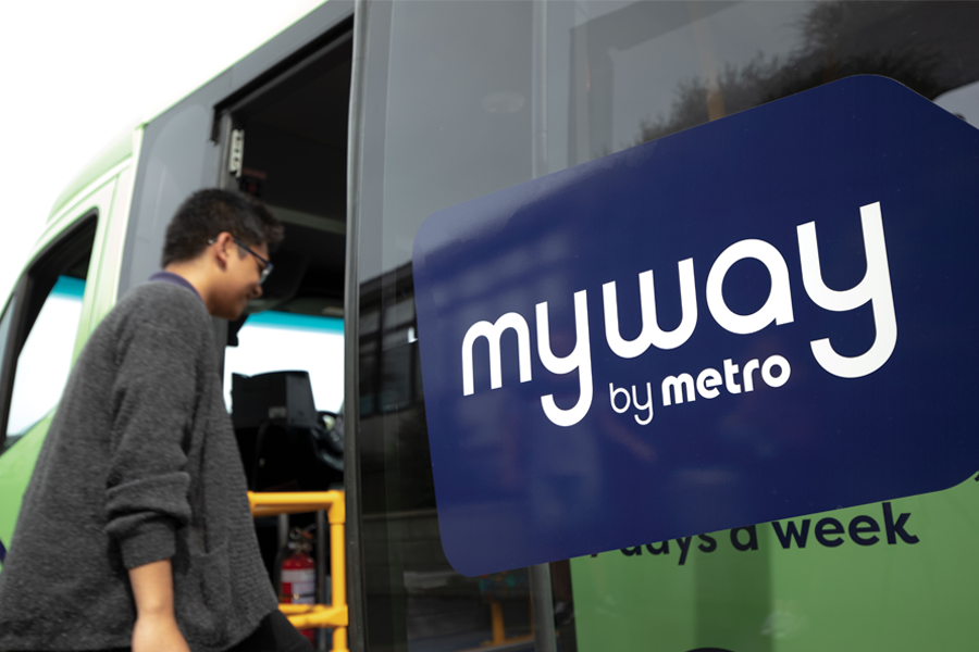 man boarding myway vehicle